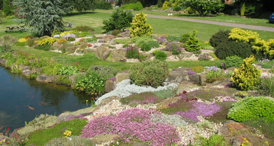  landscaped gardens which includes large rockeries, raised walls, 